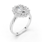 A Brilliant Round Diamond in a Sculptural Sunburst