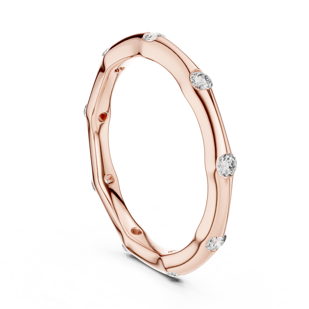 A Hand-Sculpted Wavy Band with Flush-Set Diamond Accents
