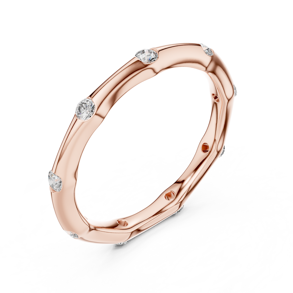 A Hand-Sculpted Wavy Band with Flush-Set Diamond Accents