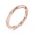 A Hand-Sculpted Wavy Band with Flush-Set Diamond Accents