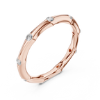 A Hand-Sculpted Wavy Band with Flush-Set Diamond Accents
