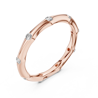 A Hand-Sculpted Wavy Band with Flush-Set Diamond Accents