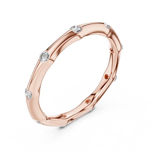 A Hand-Sculpted Wavy Band with Flush-Set Diamond Accents