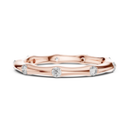 A Hand-Sculpted Wavy Band with Flush-Set Diamond Accents