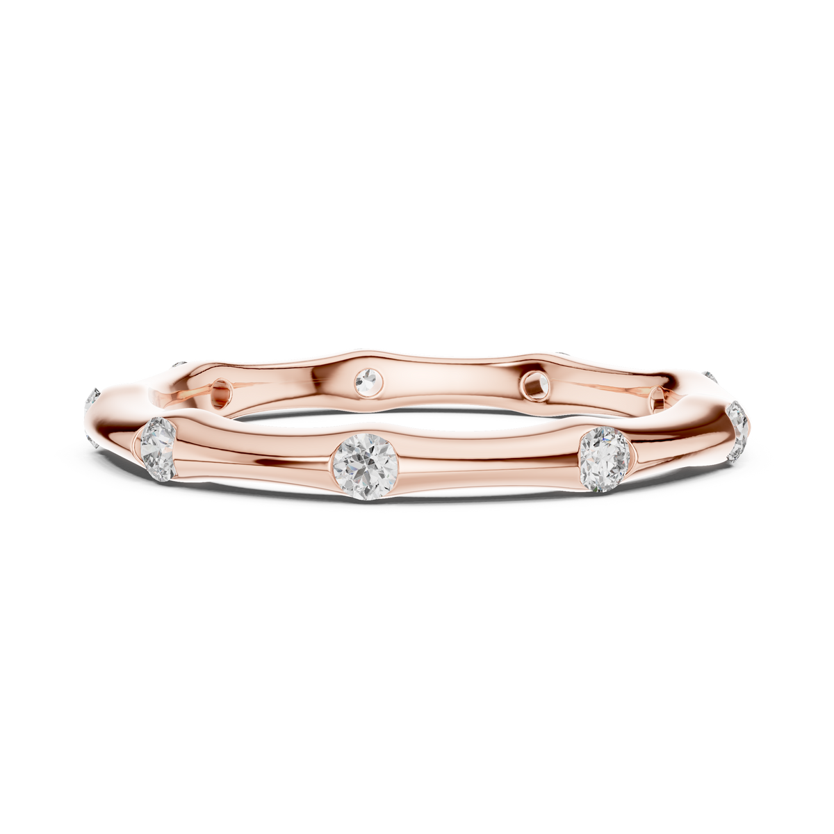 A Hand-Sculpted Wavy Band with Flush-Set Diamond Accents