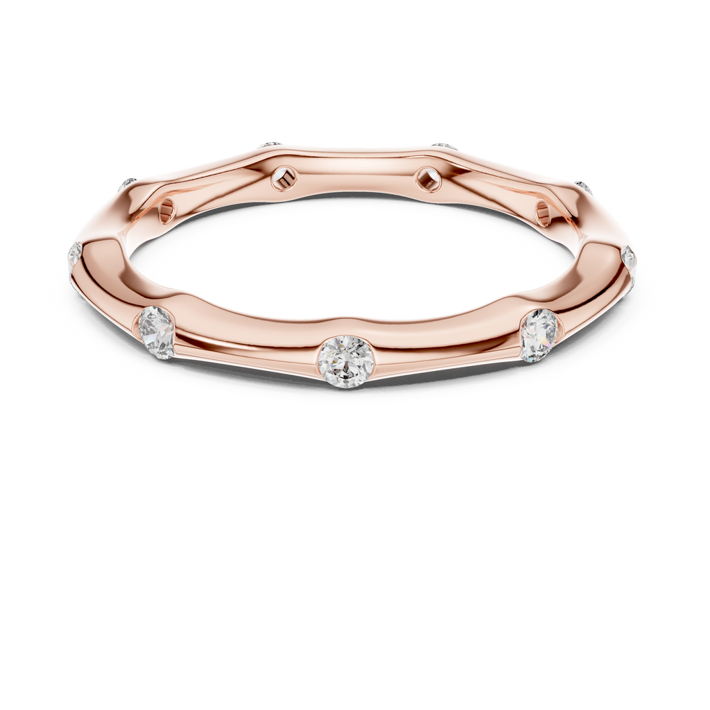 A Hand-Sculpted Wavy Band with Flush-Set Diamond Accents