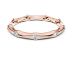 A Hand-Sculpted Wavy Band with Flush-Set Diamond Accents