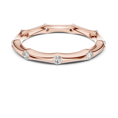 A Hand-Sculpted Wavy Band with Flush-Set Diamond Accents