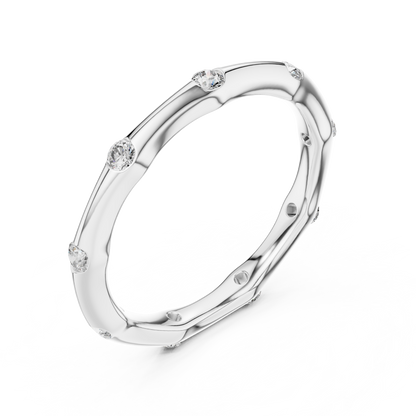 A Hand-Sculpted Wavy Band with Flush-Set Diamond Accents