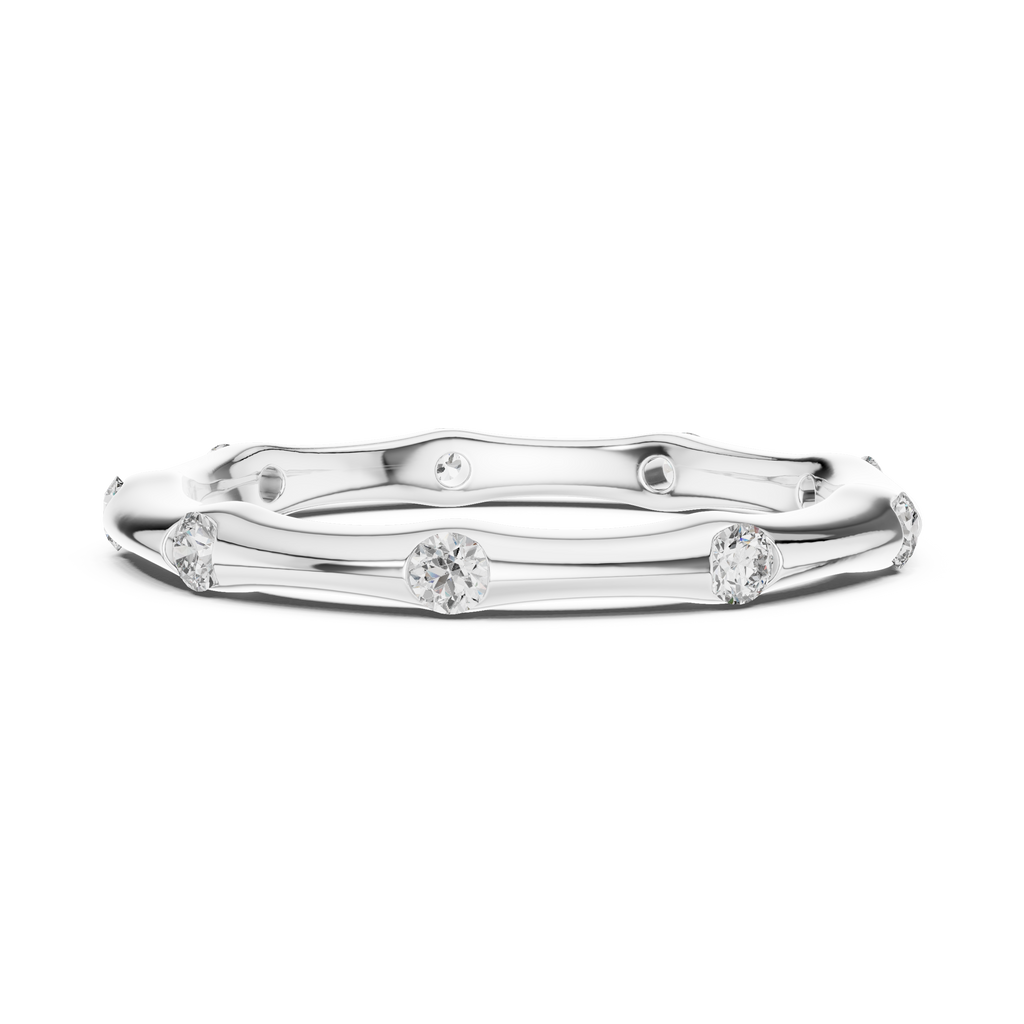 A Hand-Sculpted Wavy Band with Flush-Set Diamond Accents