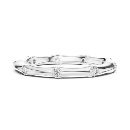 A Hand-Sculpted Wavy Band with Flush-Set Diamond Accents