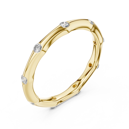 A Hand-Sculpted Wavy Band with Flush-Set Diamond Accents