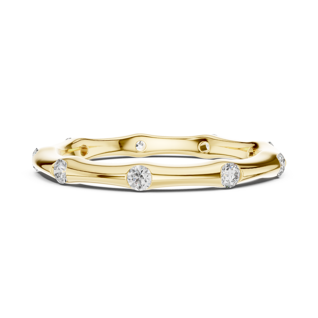 A Hand-Sculpted Wavy Band with Flush-Set Diamond Accents