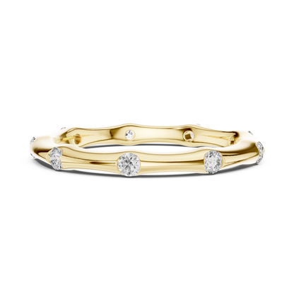 A Hand-Sculpted Wavy Band with Flush-Set Diamond Accents