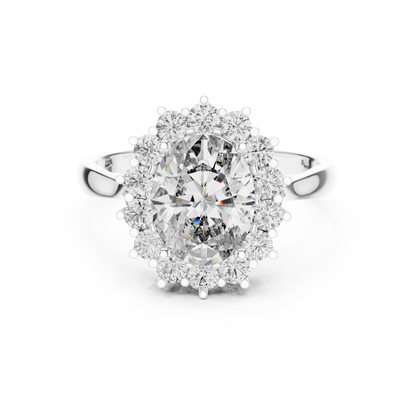A Brilliant Round Diamond in a Sculptural Sunburst