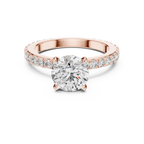 A Round Brilliant Solitaire on a Delicate Hand-Set Band