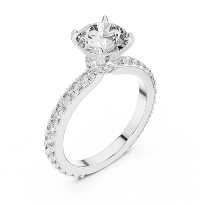 A Round Brilliant Solitaire on a Delicate Hand-Set Band