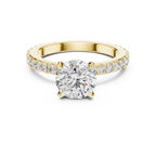 A Round Brilliant Solitaire on a Delicate Hand-Set Band