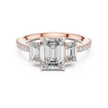 Emerald-Cut Center with Matched Side Stones on a Shimmering