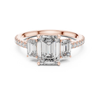 Emerald-Cut Center with Matched Side Stones on a Shimmering