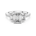 Emerald-Cut Center with Matched Side Stones on a Shimmering