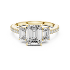 Emerald-Cut Center with Matched Side Stones on a Shimmering