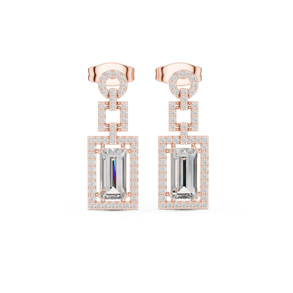 Elegant White Gold Drop Earrings Featuring Emerald Cut Diamonds