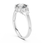Brilliant Cushion Cut Ring with Trillion-Cut Accent Stones