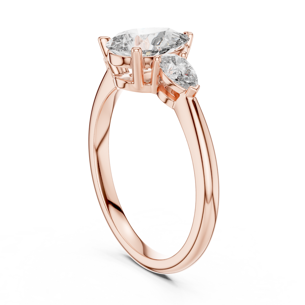 Brilliant Pear-Shaped Center Stone with Matching Tapered Accents