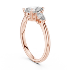Brilliant Pear-Shaped Center Stone with Matching Tapered Accents
