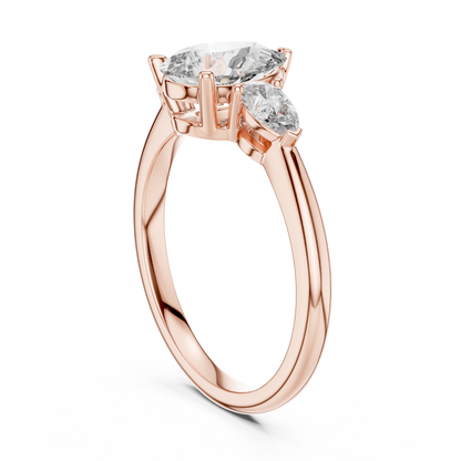 Brilliant Pear-Shaped Center Stone with Matching Tapered Accents