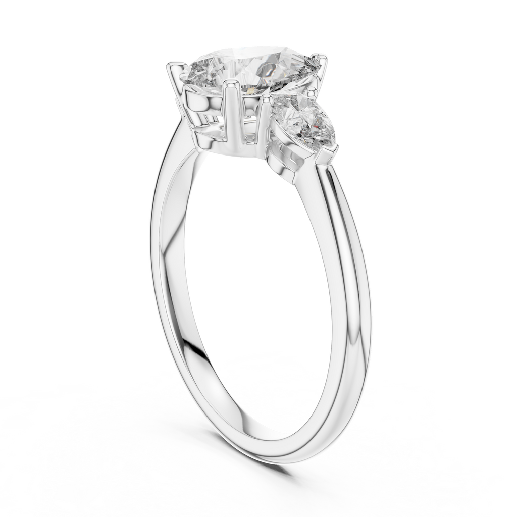 Brilliant Pear-Shaped Center Stone with Matching Tapered Accents