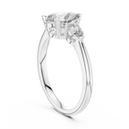 Brilliant Pear-Shaped Center Stone with Matching Tapered Accents