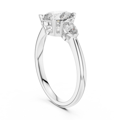 Brilliant Pear-Shaped Center Stone with Matching Tapered Accents