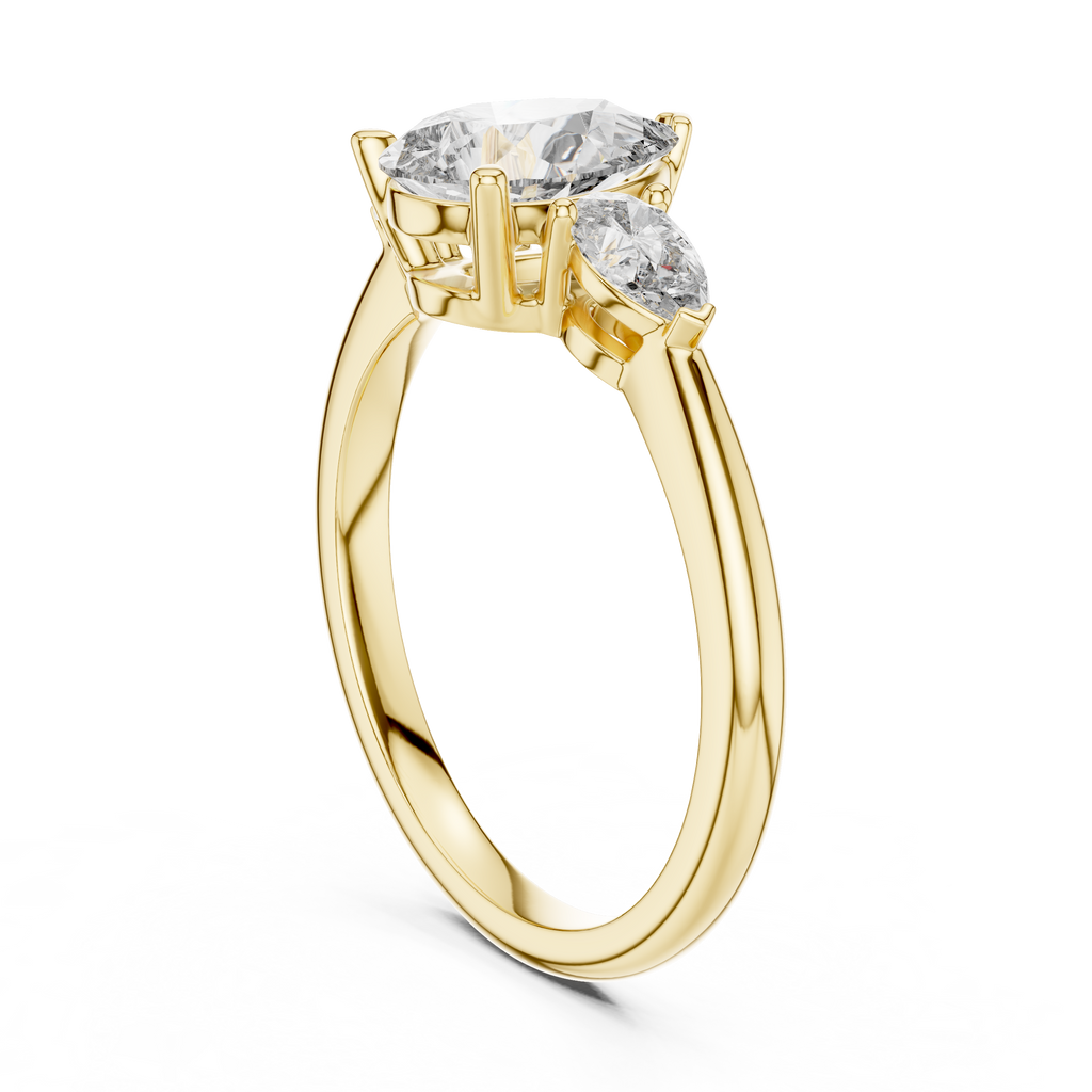 Brilliant Pear-Shaped Center Stone with Matching Tapered Accents