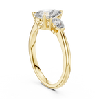 Brilliant Pear-Shaped Center Stone with Matching Tapered Accents