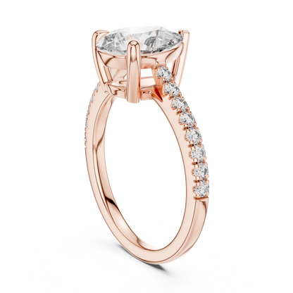 Brilliant Teardrop Diamond with a Sparkling Diamond-Encrusted Band