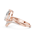 Brilliant Pear Diamond Ring with a Graduated Diamond