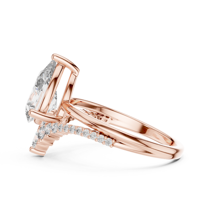 Brilliant Pear Diamond Ring with a Graduated Diamond