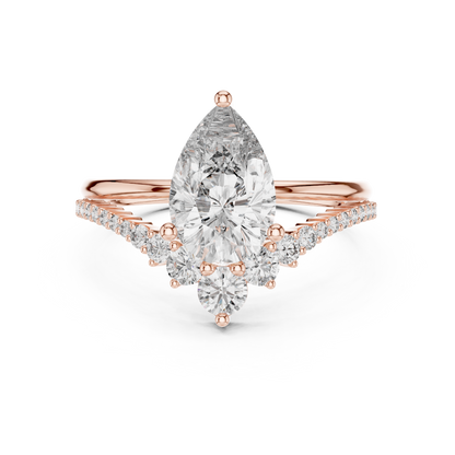 Brilliant Pear Diamond Ring with a Graduated Diamond