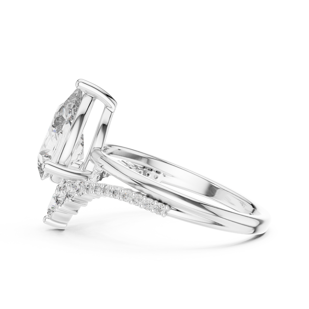 Brilliant Pear Diamond Ring with a Graduated Diamond
