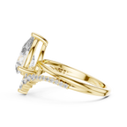 Brilliant Pear Diamond Ring with a Graduated Diamond