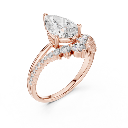Brilliant Pear Diamond Ring with a Graduated Diamond