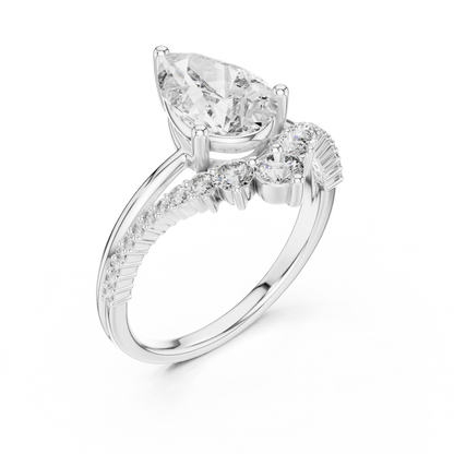 Brilliant Pear Diamond Ring with a Graduated Diamond