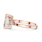 Step-Cut Center with Multi-Shape Diamond Side Accents