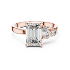 Step-Cut Center with Multi-Shape Diamond Side Accents