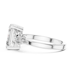 Step-Cut Center with Multi-Shape Diamond Side Accents