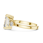 Step-Cut Center with Multi-Shape Diamond Side Accents