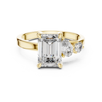 Step-Cut Center with Multi-Shape Diamond Side Accents