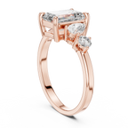 Step-Cut Center with Multi-Shape Diamond Side Accents